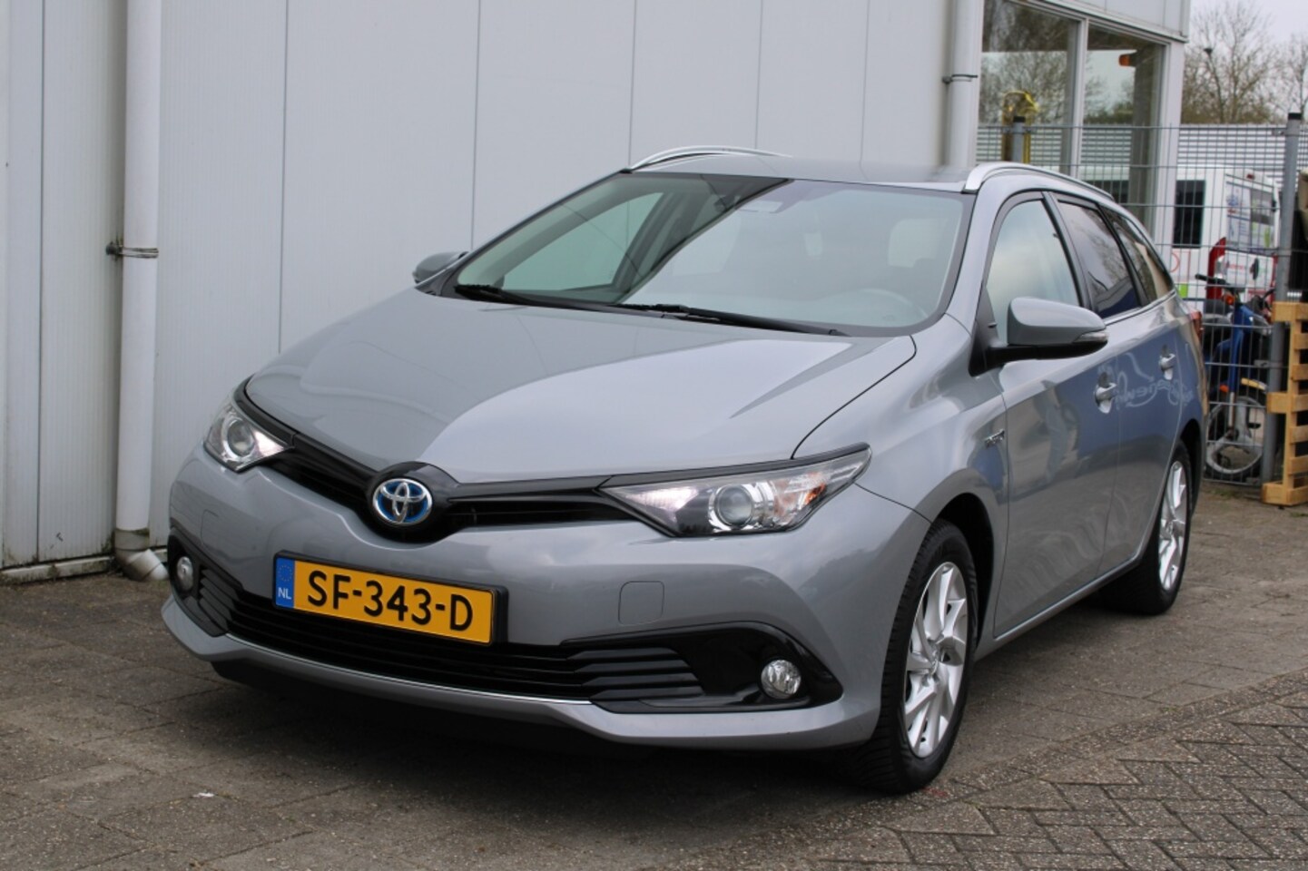 Toyota Auris Touring Sports - 1.8 Hybride Dynamic TS - AutoWereld.nl