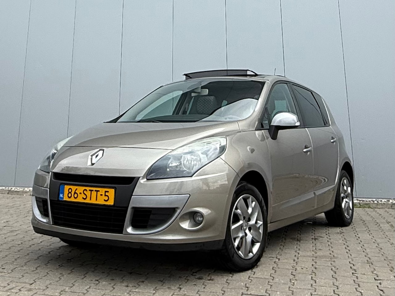 Renault Scénic - 1.6 Parisienne E85 panoramadak - AutoWereld.nl