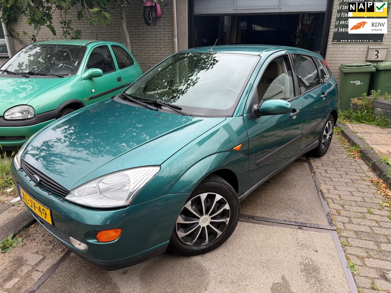 Ford Focus - 1.6-16V Ghia Apk|Airco|Elek.ramen|Bluetooth audio - AutoWereld.nl