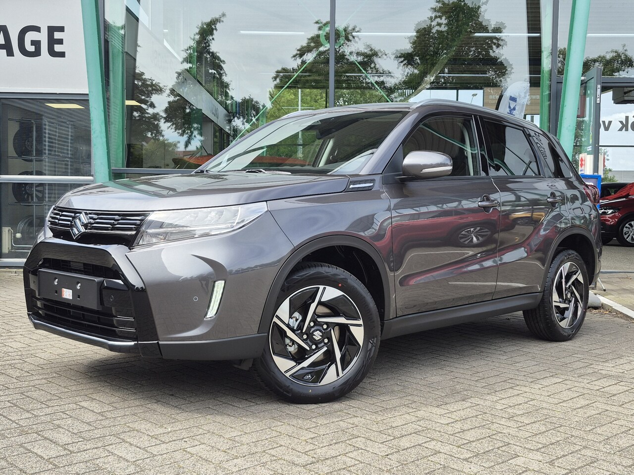 Suzuki Vitara - 1.5 Hybrid Style Automaat 102 pk | Tot 12 jaar fabrieksgarantie | Achteruitrijcamera | Cru - AutoWereld.nl