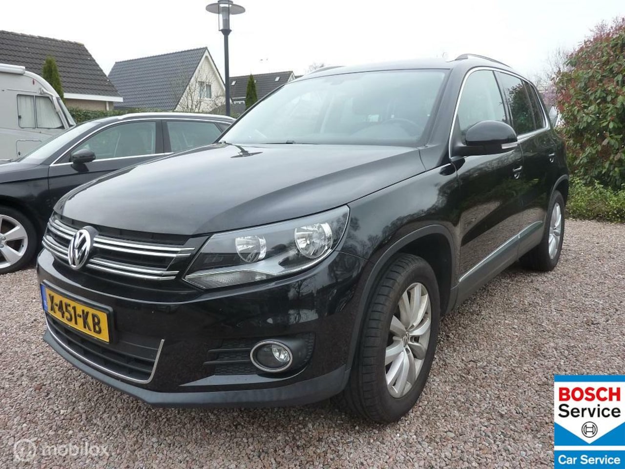 Volkswagen Tiguan - 1.4 TSI Sport&Style - AutoWereld.nl