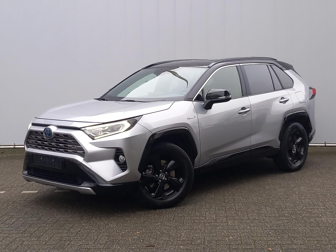 Toyota RAV4 - 2.5 Hybrid AWD Bi-Tone 1650kg Trekgewicht - AutoWereld.nl