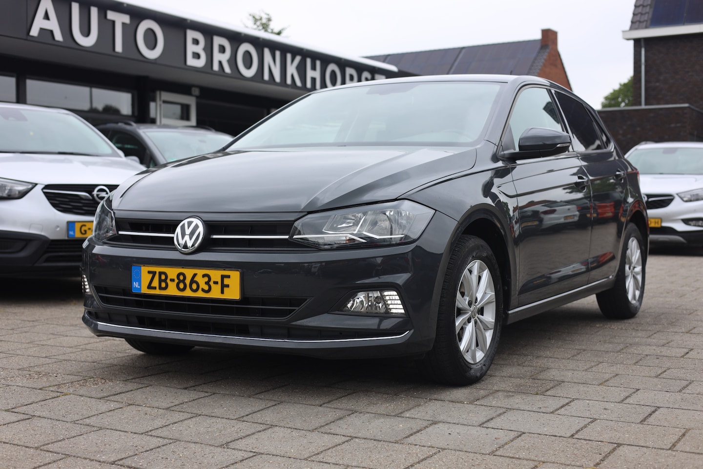 Volkswagen Polo - 1.0 TSI COMFORTLINE | NAVI | CLIMA | CRUISE | CARPLAY - AutoWereld.nl