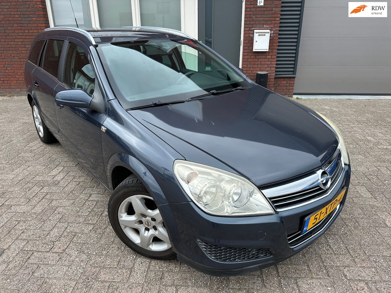 Opel Astra Wagon - 1.4 Temptation / Airco / Cruise - AutoWereld.nl