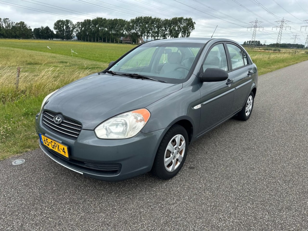 Hyundai Accent - 1.4i Dynamic AIRCO ! - AutoWereld.nl