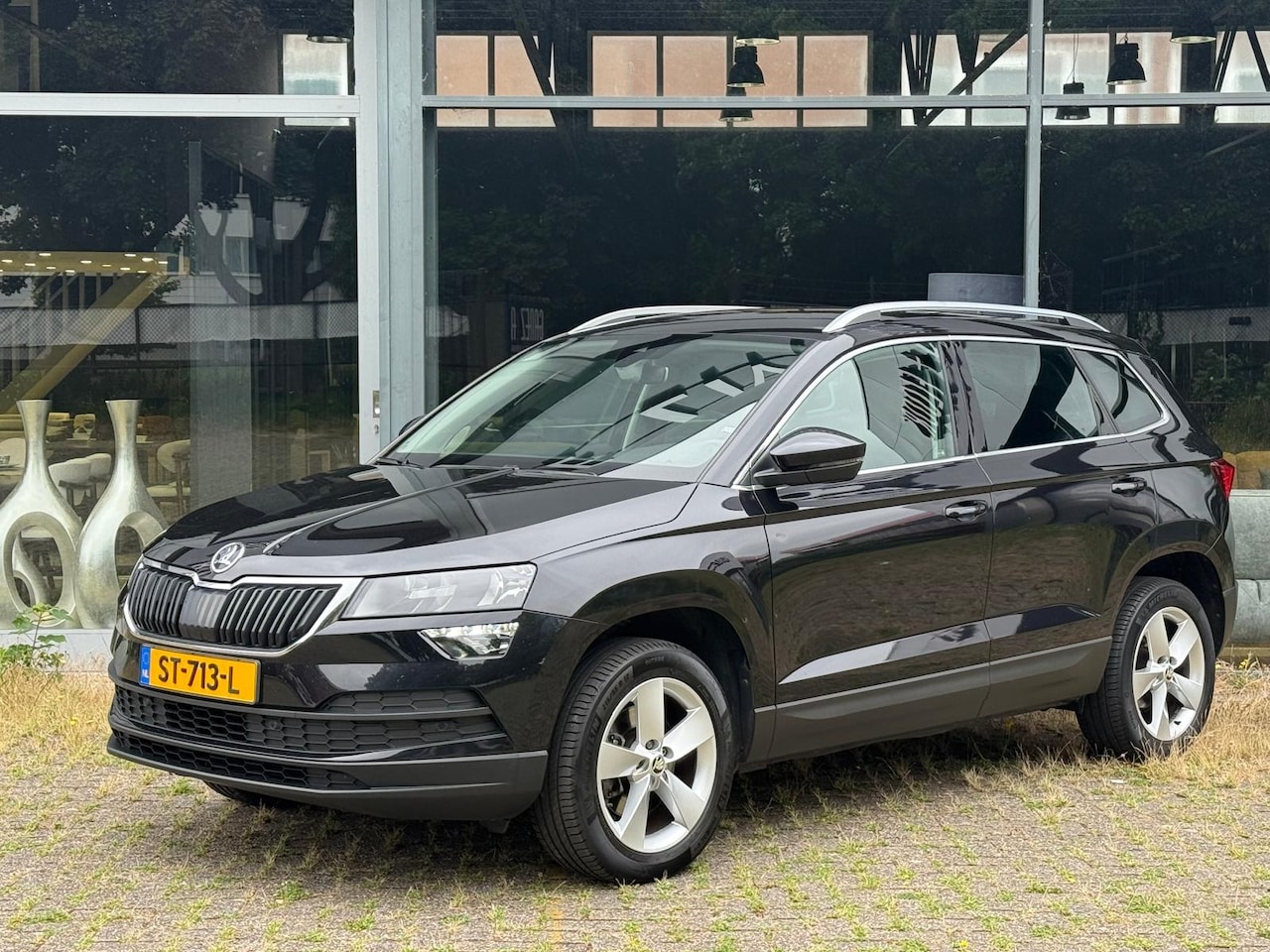 Skoda Karoq - 1.0 TSI Ambition Business Nap Trekhaak Automaat - AutoWereld.nl