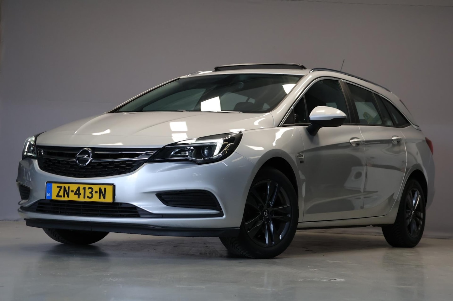 Opel Astra Sports Tourer - 1.4 Turbo 120 Jahre|Automaat|Pano|Carplay|Trekhaak - AutoWereld.nl
