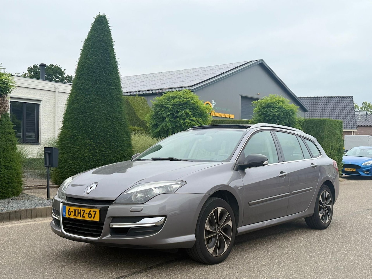 Renault Laguna Estate - 1.5 dCi Bose 2014 Pano/Navi/Clima/Lmv - AutoWereld.nl