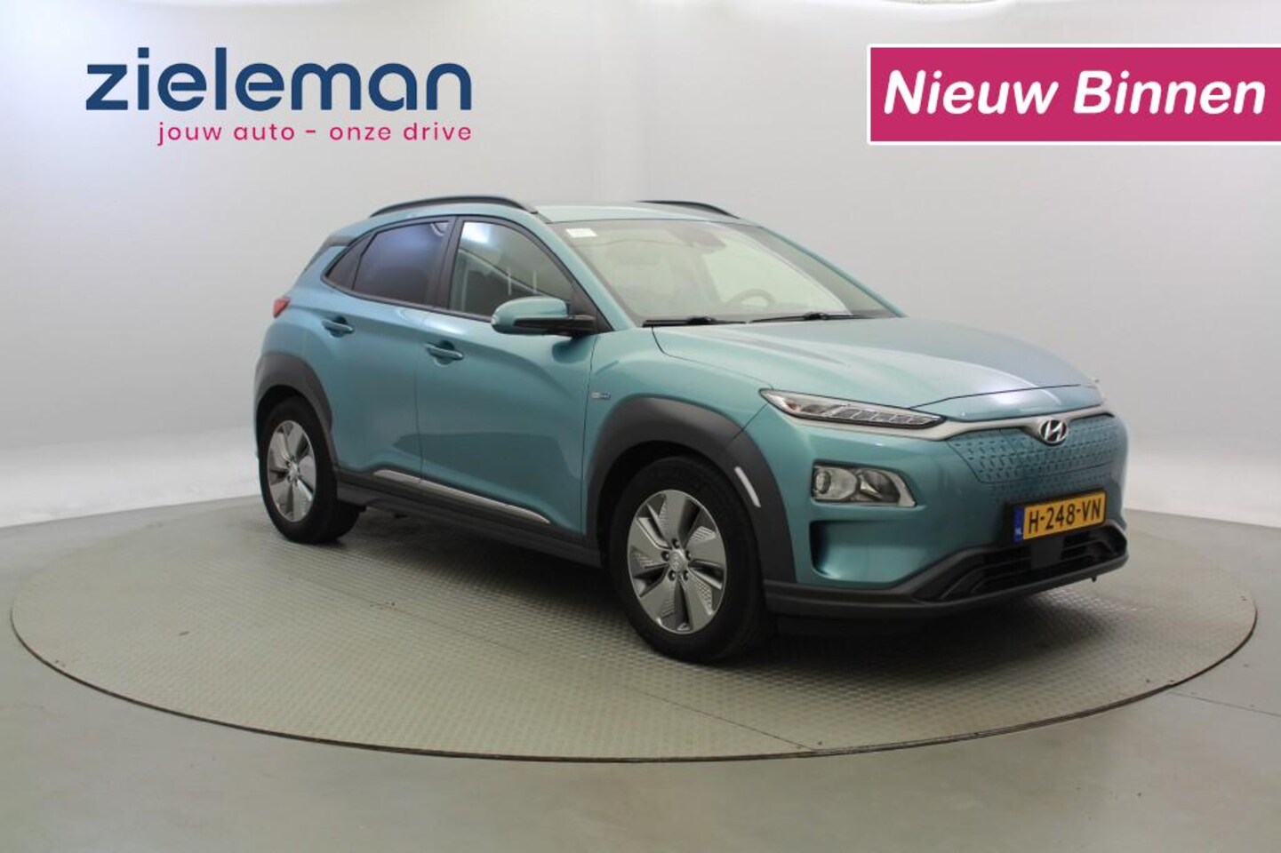 Hyundai Kona Electric - Electric Fashion 64 kWh - Carplay, Camera, SOH 100% - AutoWereld.nl