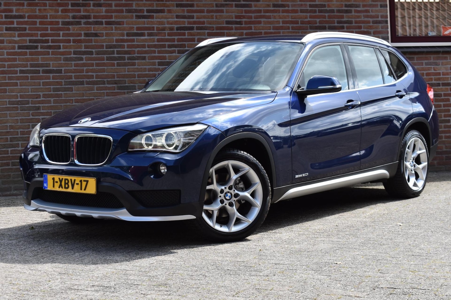 BMW X1 - SDrive20i Executive '14 Xenon Clima Navi Cruise Inruil mogelijk - AutoWereld.nl