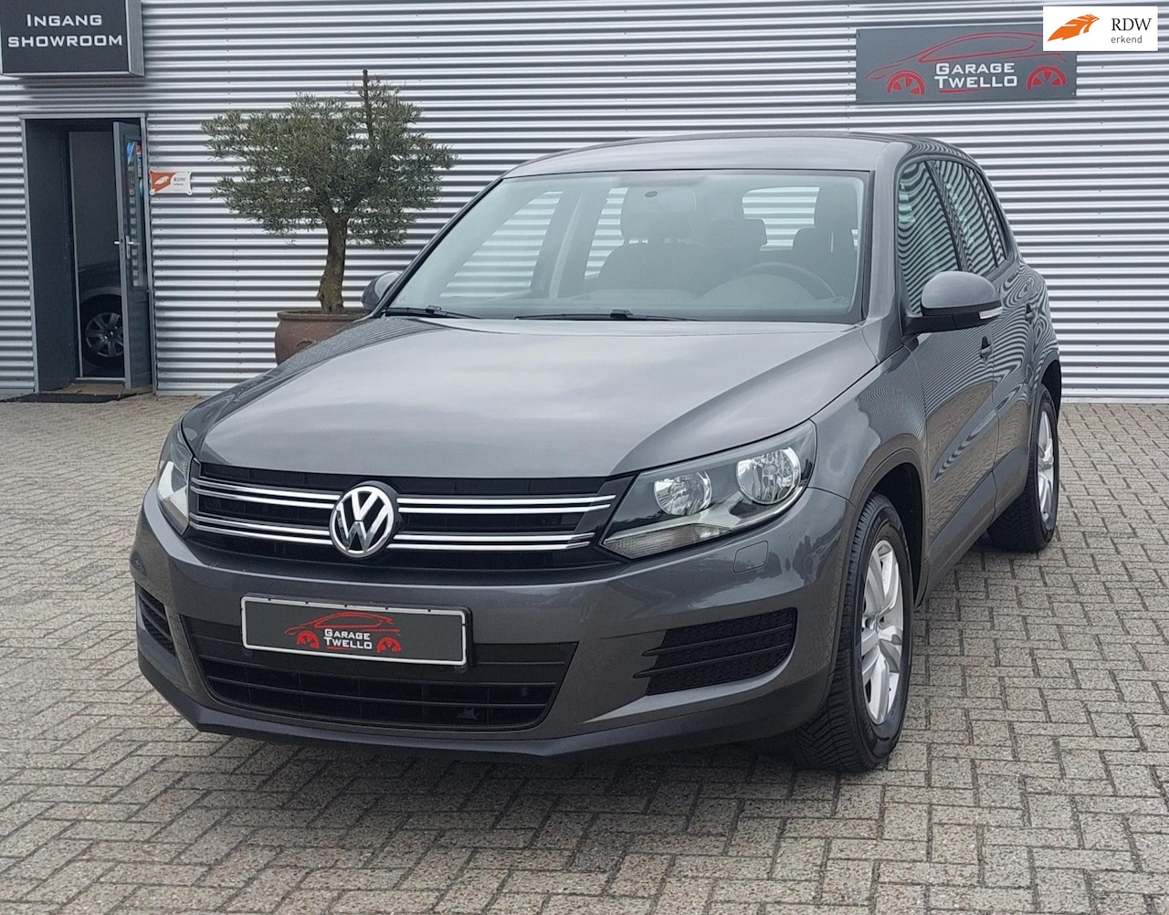 Volkswagen Tiguan - 1.4 TSI Comfort&Design Edition navi,stoelverwarming,cruise controll - AutoWereld.nl