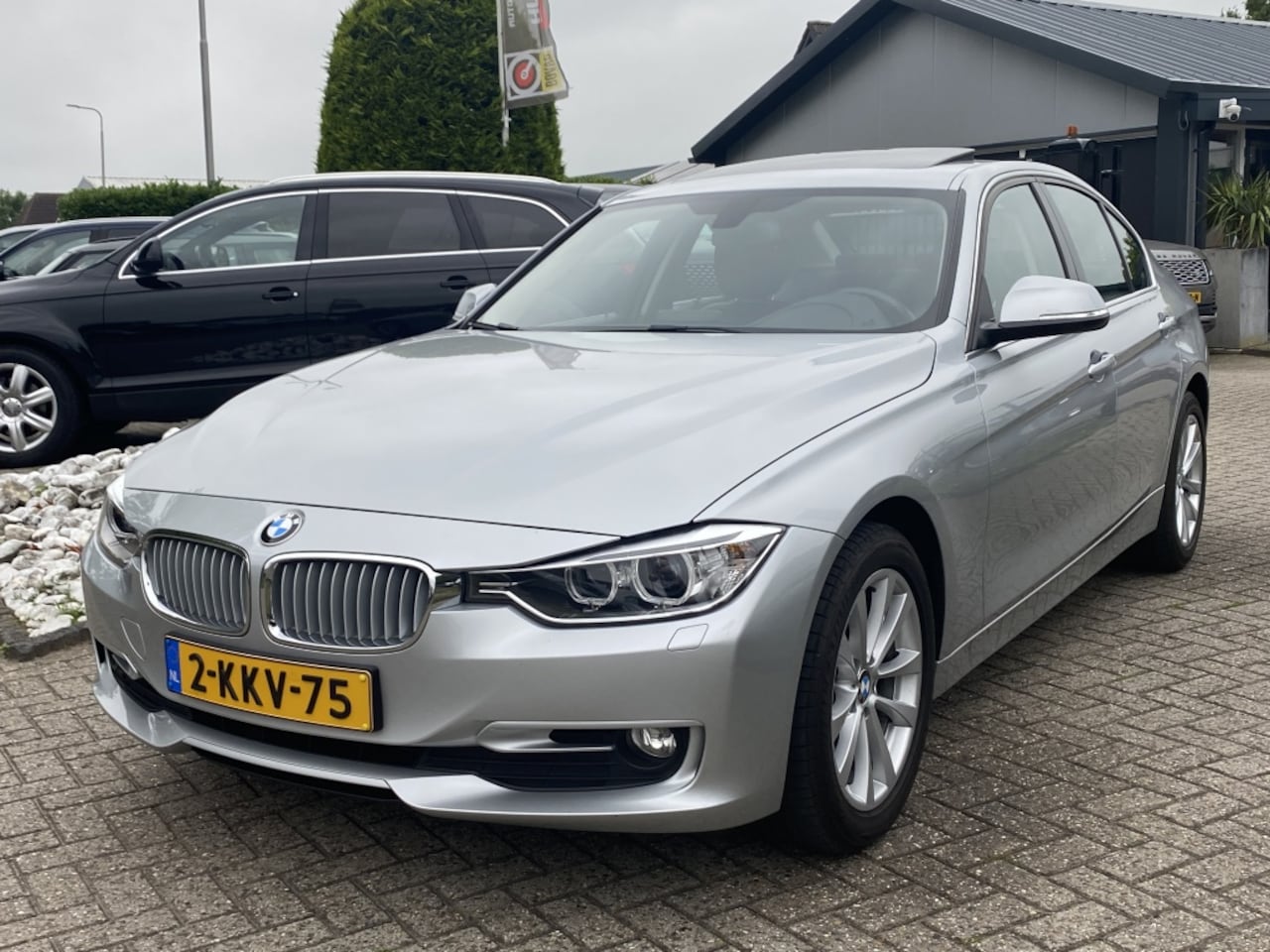BMW 3-serie - 316i High Exe Sport Sedan 2013 NL Auto Schuifdak - AutoWereld.nl