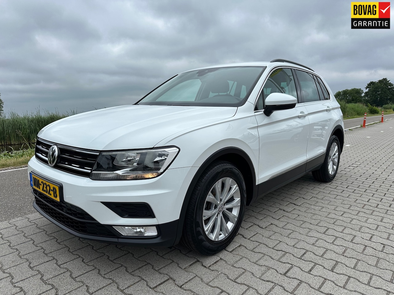 Volkswagen Tiguan - 1.4 TSI Comfortline 1.4 TSI Comfortline, Navi, Cruisecontrol, PDC, Bluetooth - AutoWereld.nl