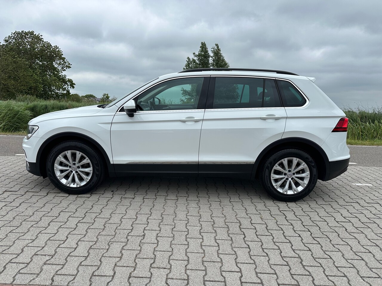 Volkswagen Tiguan - 1.4 TSI Comfortline 1.4 TSI Comfortline, Navi, Cruisecontrol, PDC, Bluetooth