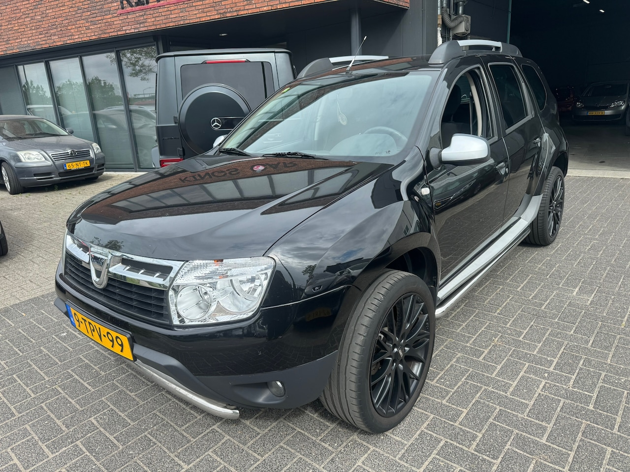 Dacia Duster - 1.6 Lauréate 2wd AIRCO BEURT+ DISTRIBUTIERIEM NIEUW - AutoWereld.nl