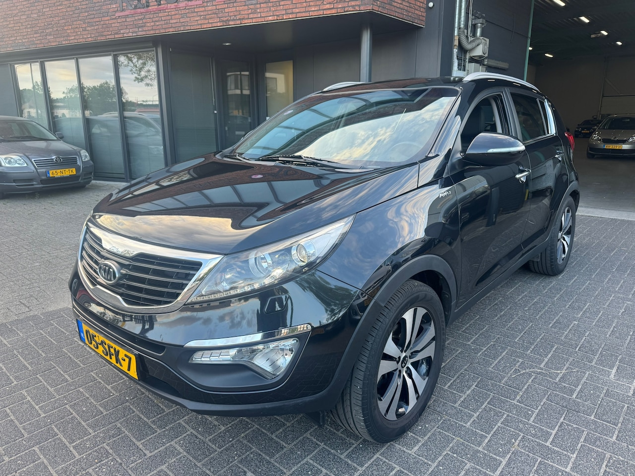 Kia Sportage - 2.0 X-clusive 4wd AUTOMAAT LEDER XENON TREKHAAK CAMERA - AutoWereld.nl