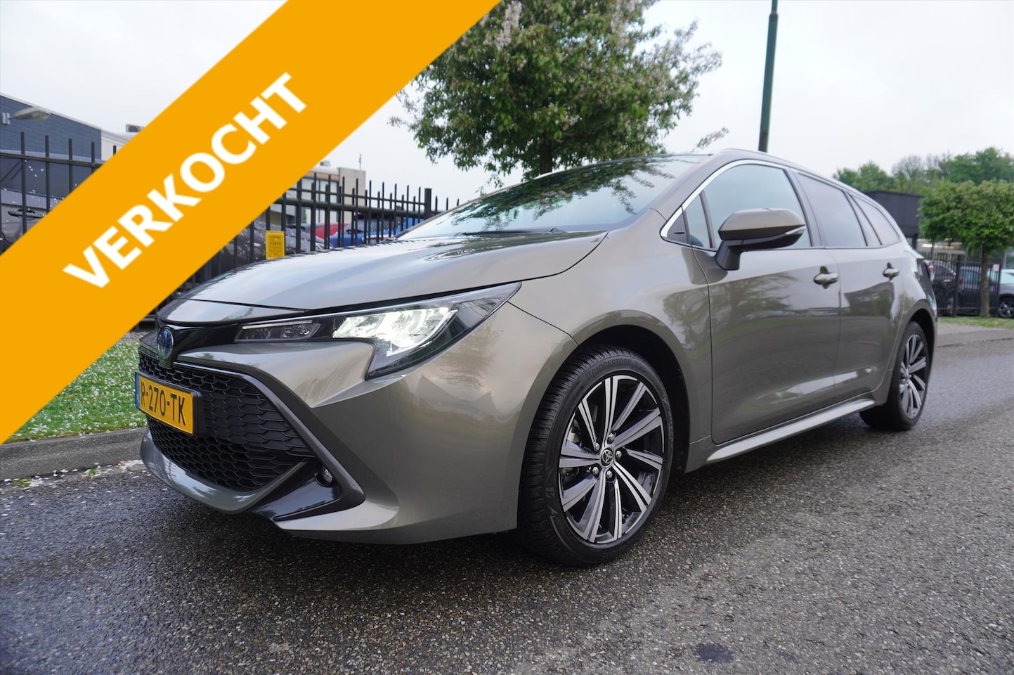 Toyota Corolla Touring Sports - 1.8 Hybrid 122pk CVT Business Plus Trekhaak Apple Carplay Navigatie - AutoWereld.nl