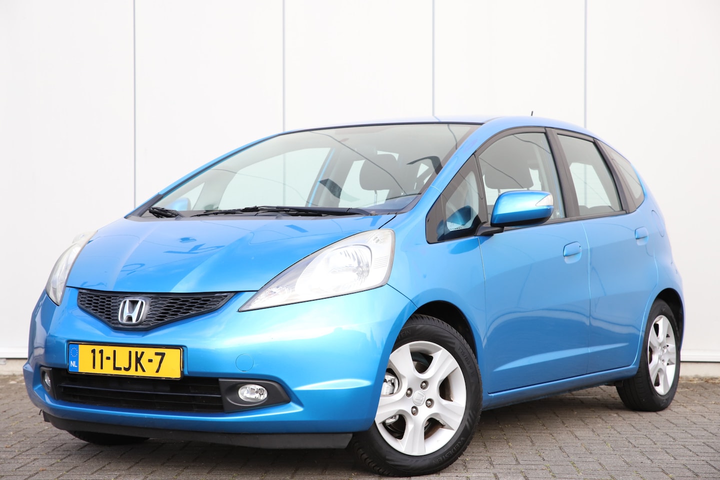 Honda Jazz - 1.4 Comfort Airco clima | Trekhaak | Clima | LMV  | PDC - AutoWereld.nl