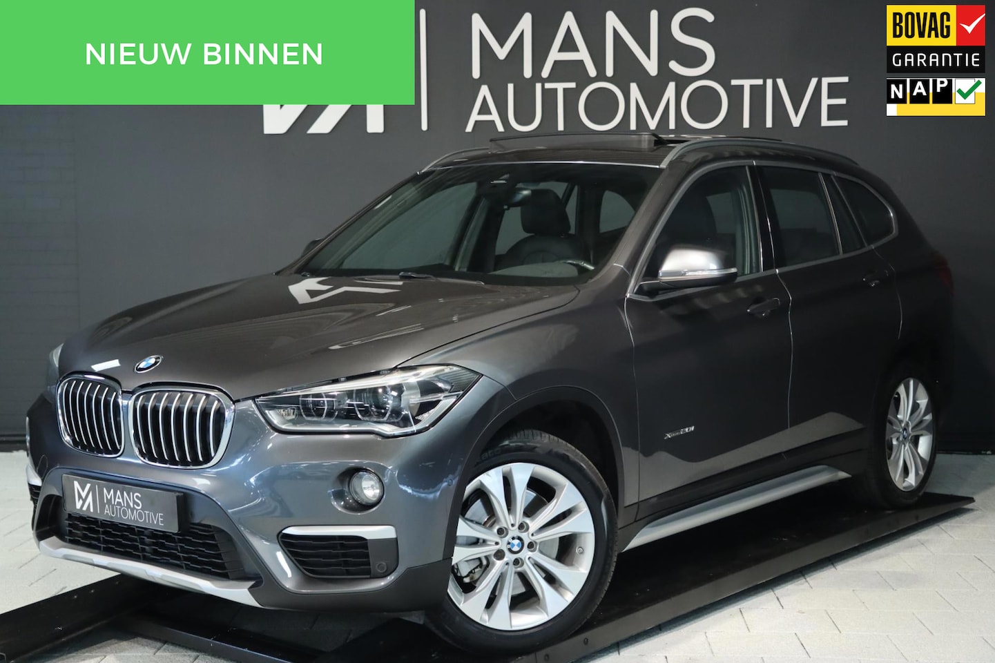 BMW X1 - XDrive20i M Sport / PANODAK / MEMORY / HUD / H&K / 18'' - AutoWereld.nl