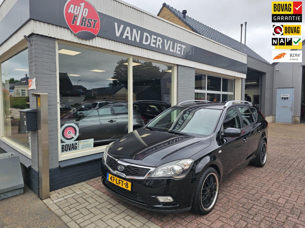 Kia Cee'd - 1.4 CVVT X-ecutive 1.4 CVVT X-ecutive - AutoWereld.nl