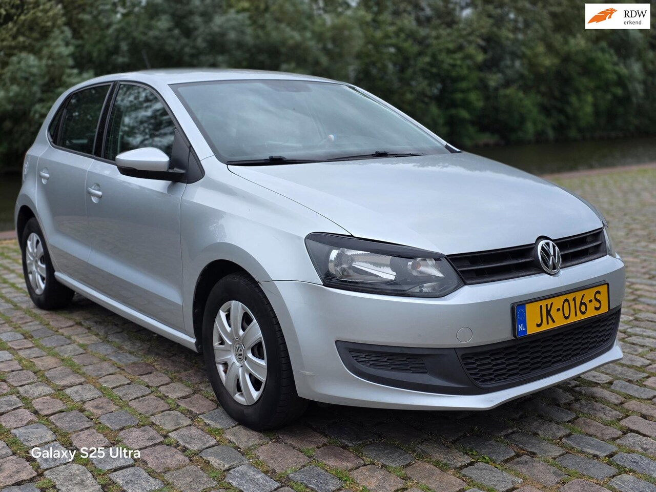 Volkswagen Polo - 1.2-12V BlueMotion Trendline airco navigatie cruis control parkeer sensor - AutoWereld.nl