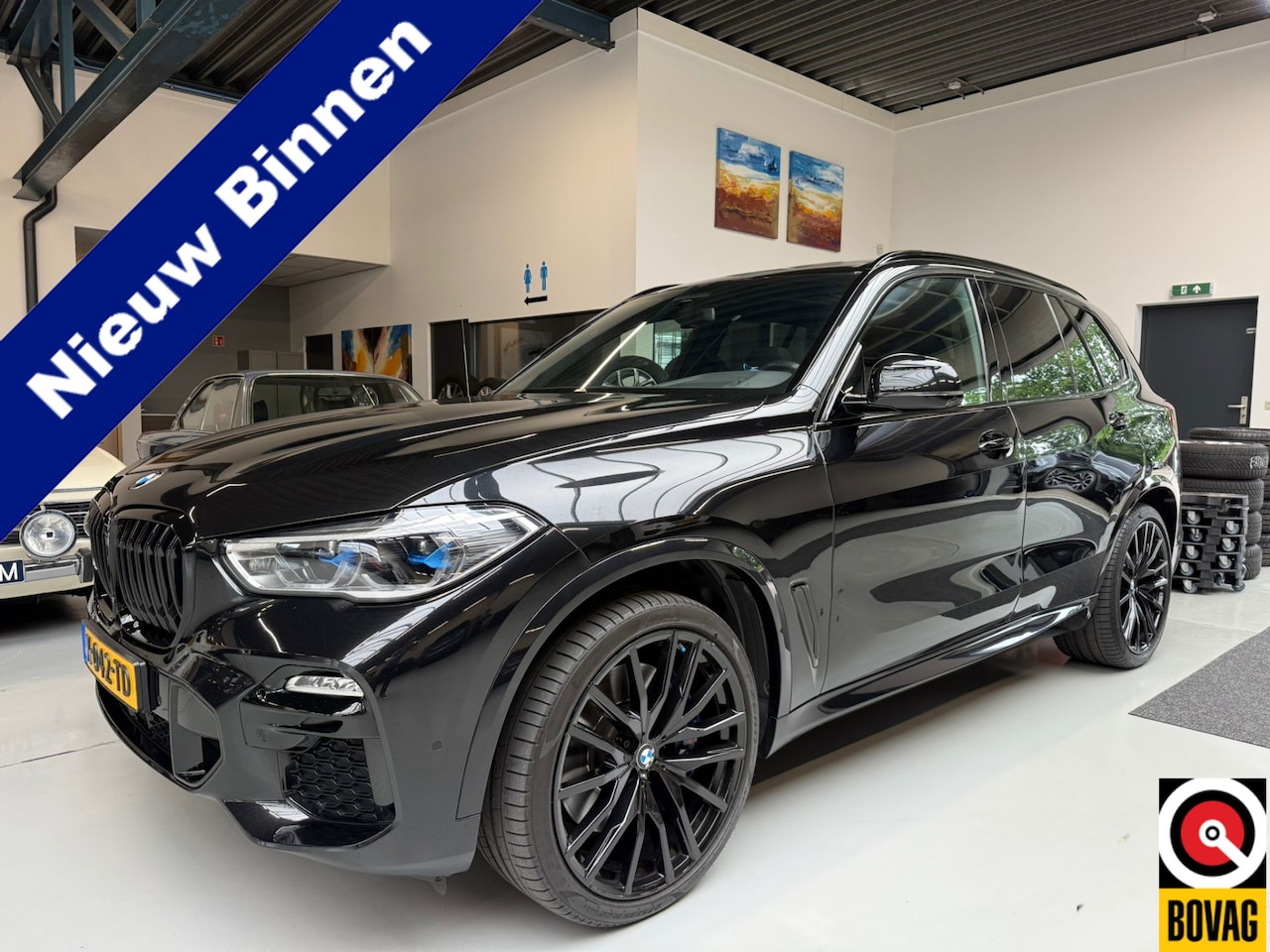 BMW X5 - xDrive40i High Executive M Sport Panoramadak Harman-Kardon Trekhaak M Sport Zetels 22 Inch - AutoWereld.nl