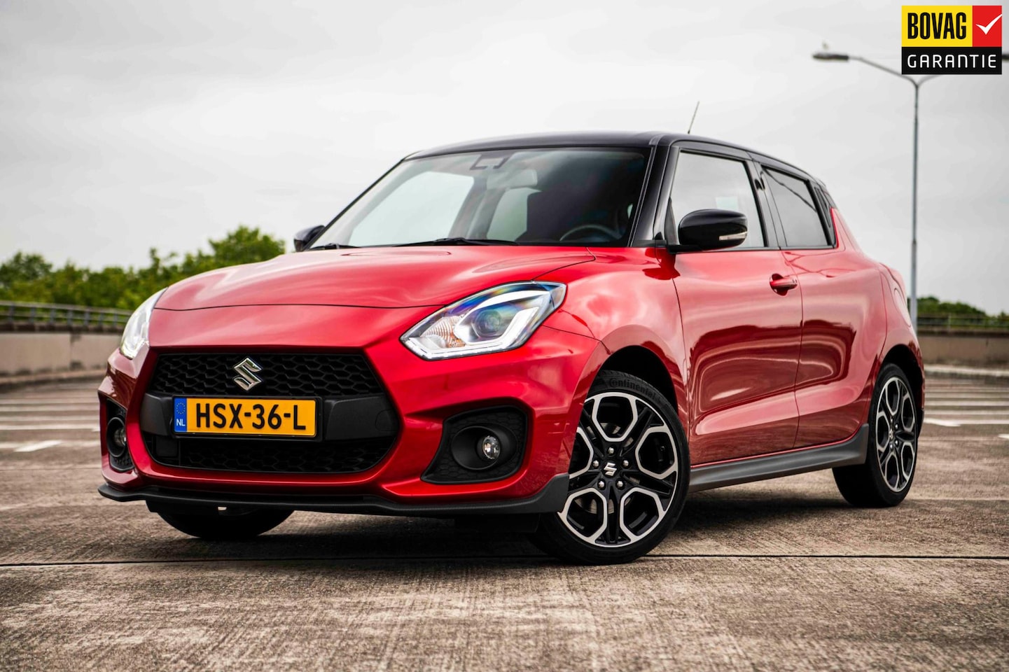 Suzuki Swift - 1.4 Sport Smart Hybrid | Airco/Clima | Adaptive Cruise Control | Stoelverwarming | Achteru - AutoWereld.nl