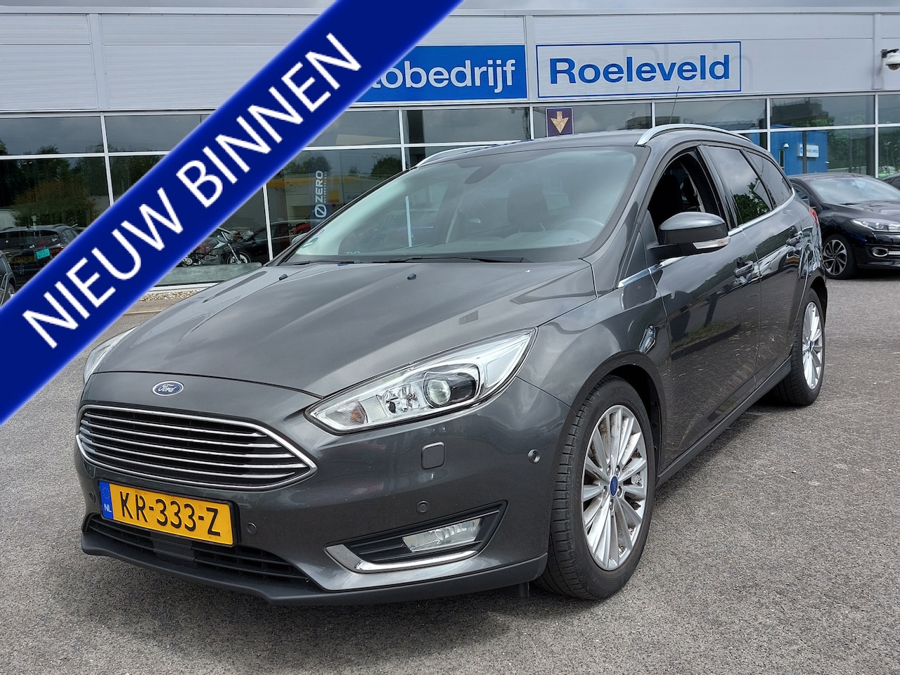 Ford Focus Wagon - 1.0 EcoBoost 125pk Titanium | Origineel NL | Navi | Apple Carplay+Android Auto | Bi-Xenon - AutoWereld.nl