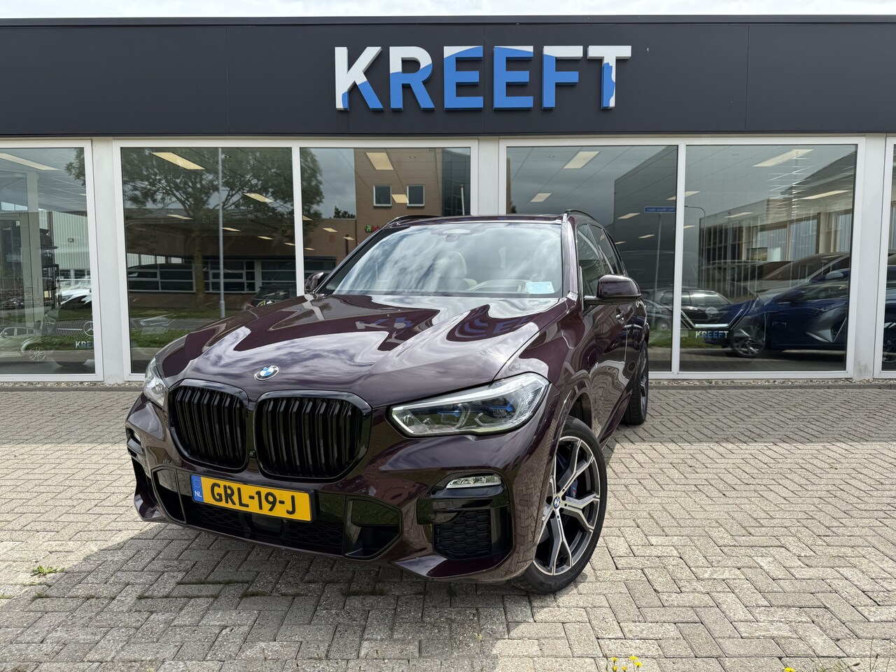 BMW X5 - xDrive45e High Executive Violet | M Sport | Lucht | Hud - AutoWereld.nl