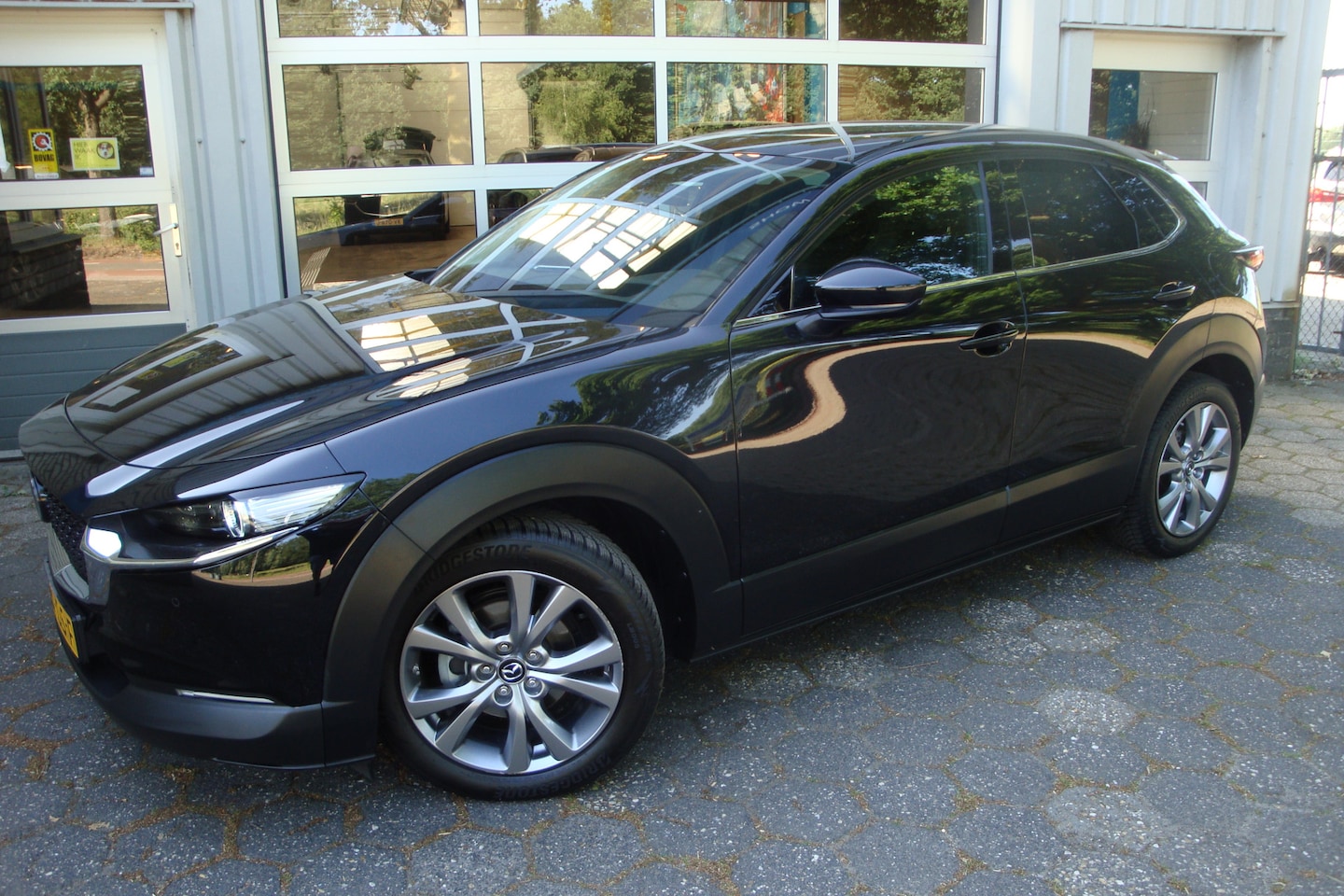 Mazda CX-30 - 2.0 e-SkyActiv-G M Hybrid Comfort / Lederen bekleding - AutoWereld.nl