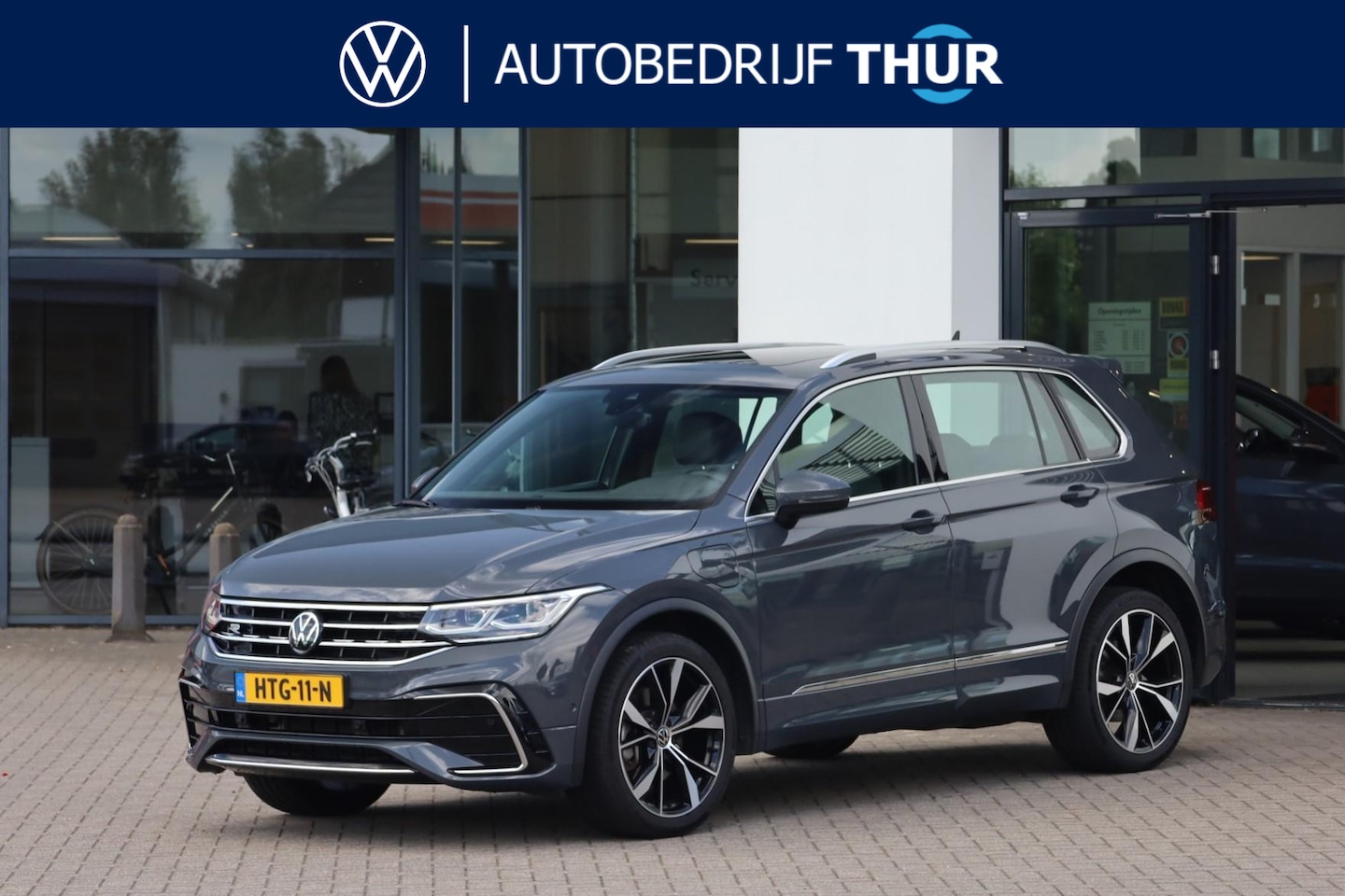 Volkswagen Tiguan - 1.4 TSI eHybrid R-Line Business+ 245PK / 180kW DSG, Wegklapbare trekhaak, panoramadak, LED - AutoWereld.nl