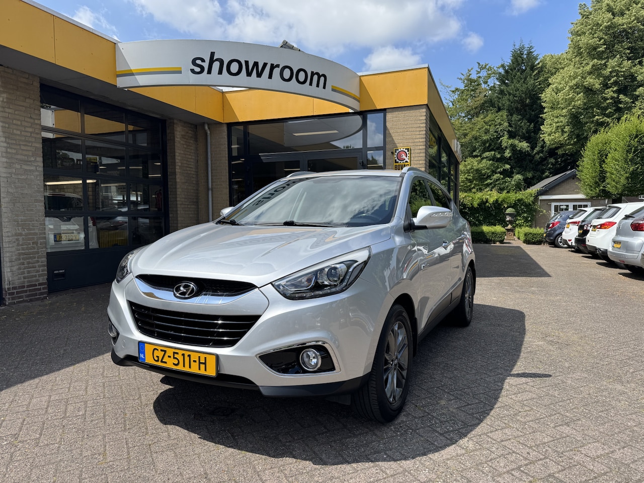 Hyundai ix35 - 1.6i GDI Go! Climate Control Navi Camera - AutoWereld.nl