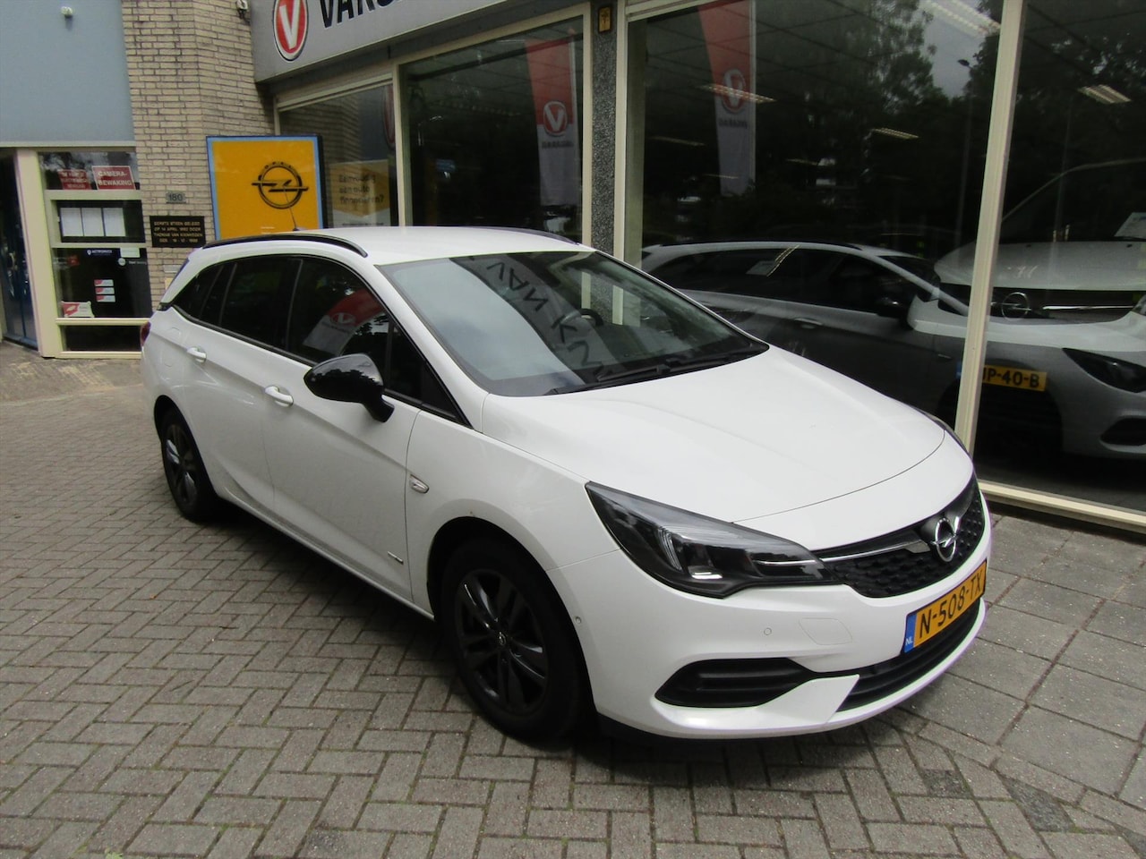 Opel Astra Sports Tourer - 1.2 Turbo 110pk NAVIGATIE CAMERA TREKHAAK - AutoWereld.nl