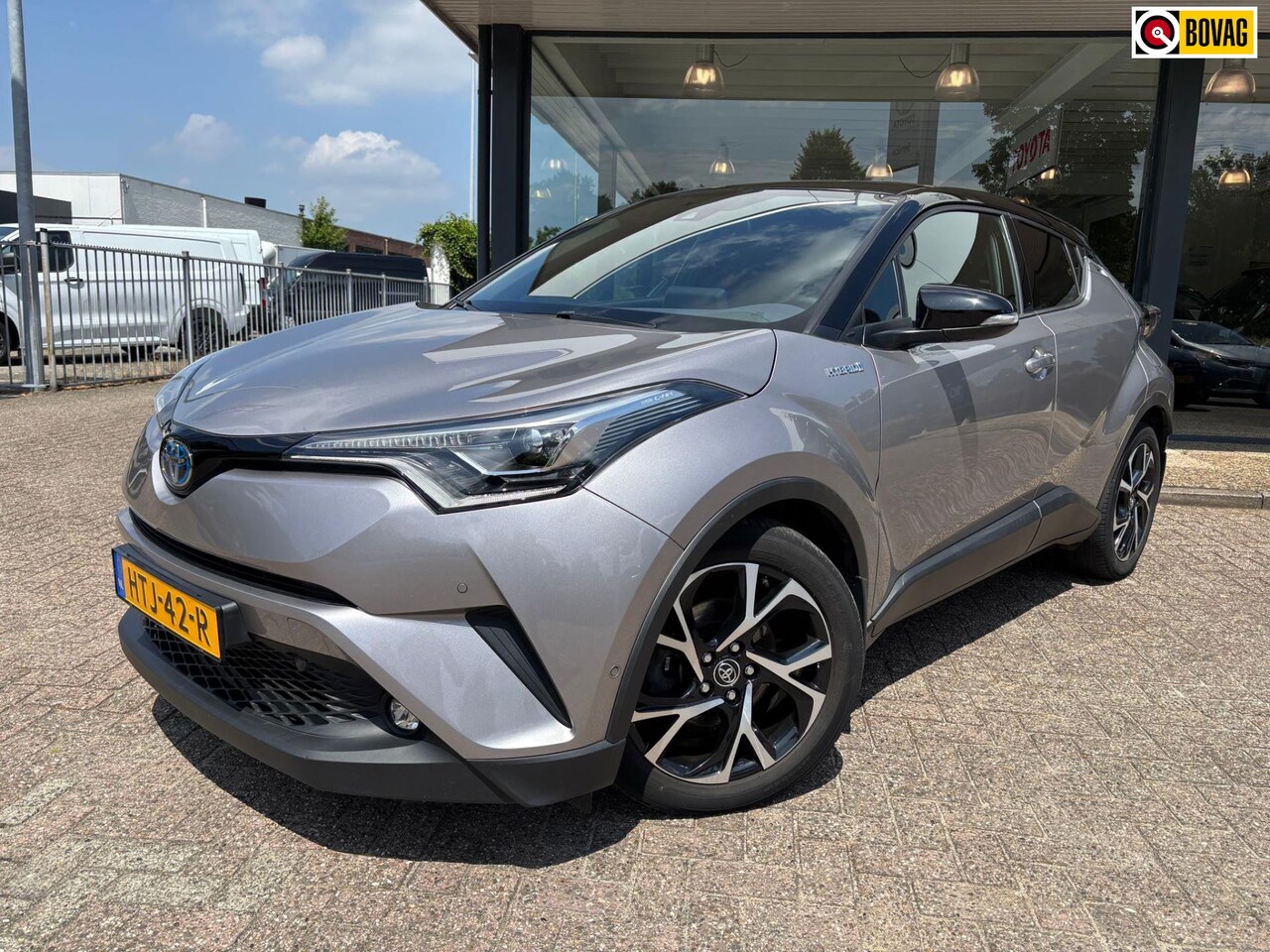 Toyota C-HR - 1.8 Hybrid Bi-Tone 1.8 Hybrid Bi-Tone - AutoWereld.nl