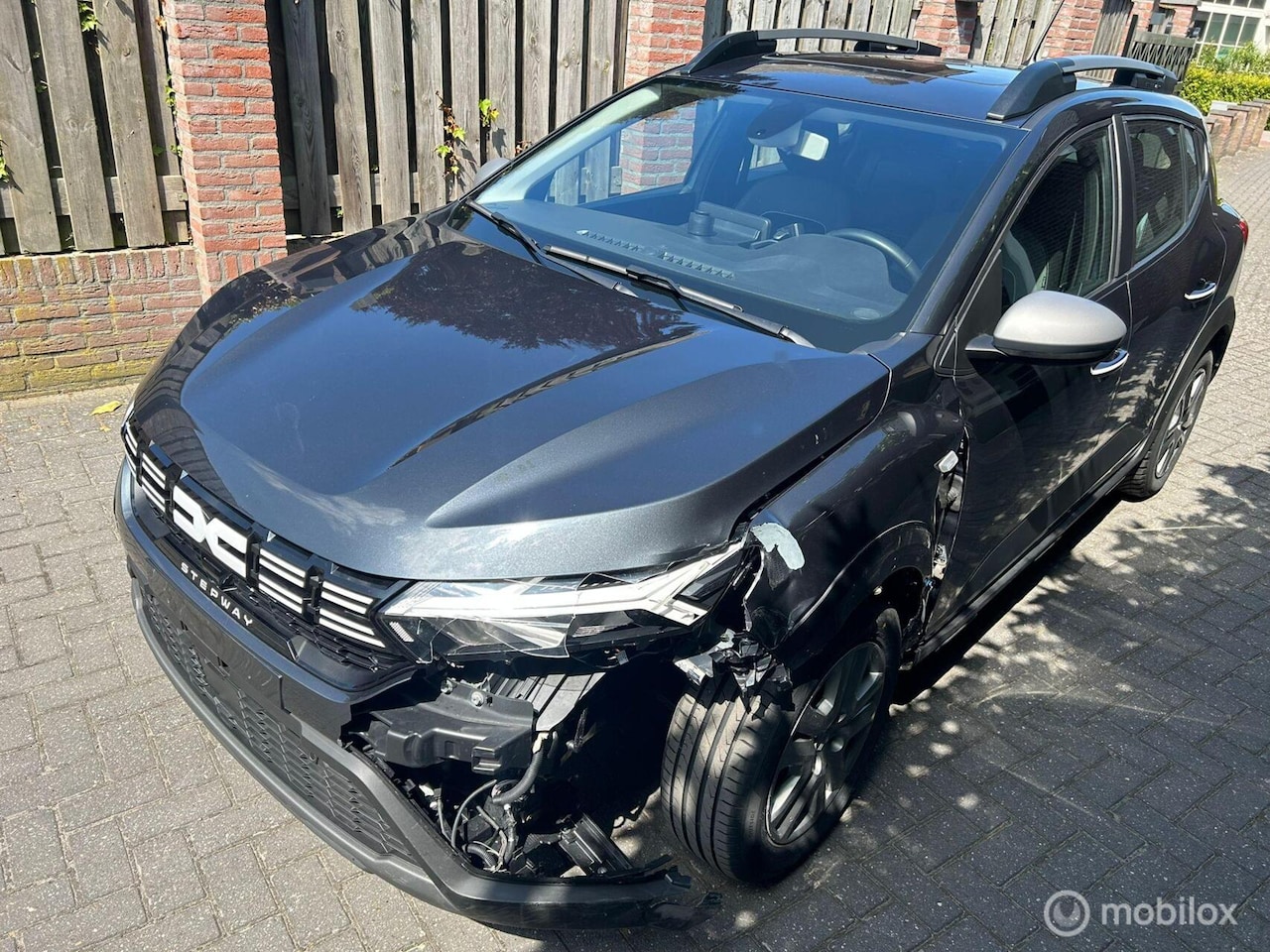 Dacia Sandero Stepway - 1.0 AUTOMAAT met L. voorschade - AutoWereld.nl