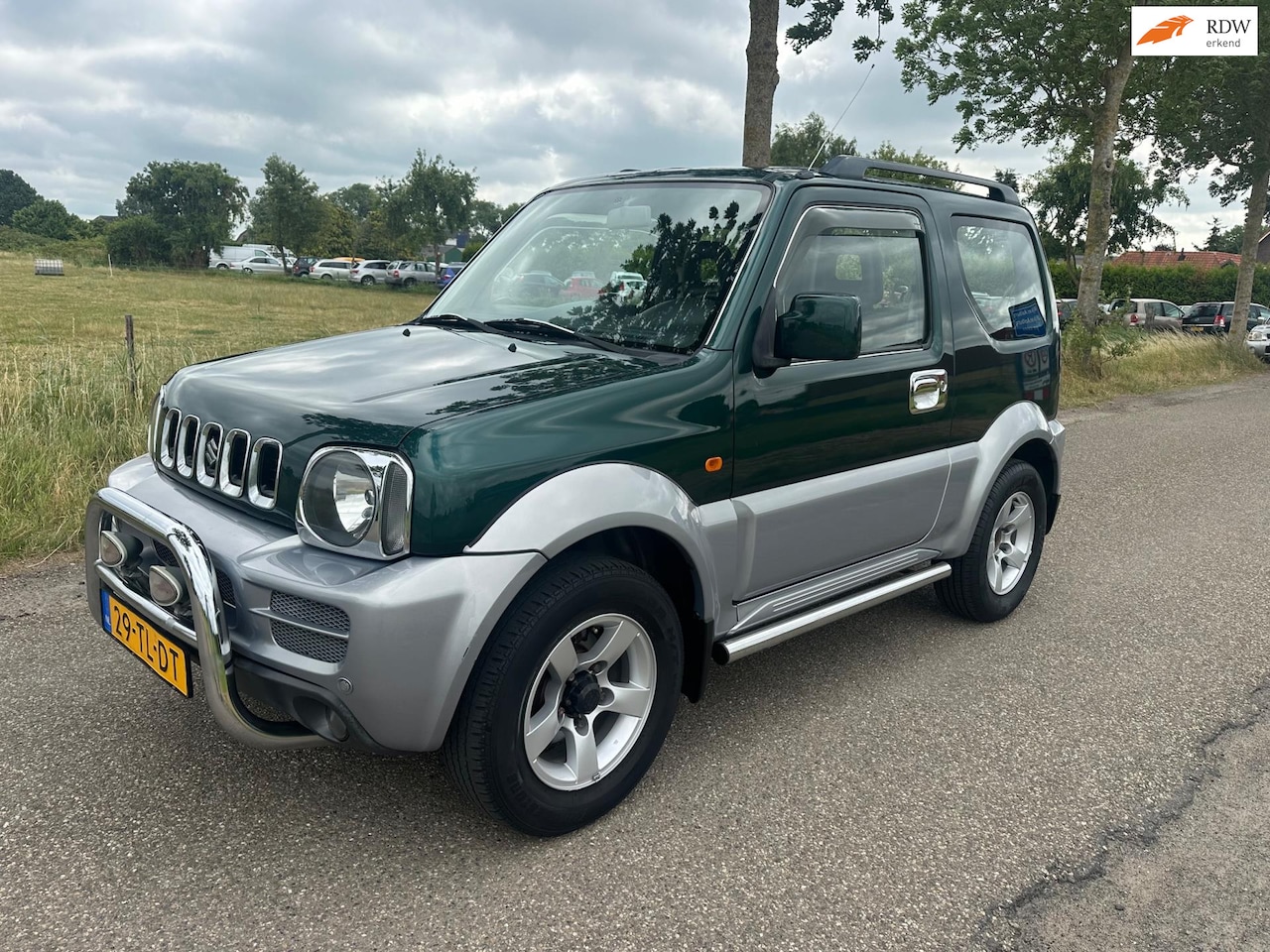 Suzuki Jimny - 1.3 Exclusive 1.3 Exclusive, Facelift/Airbags/Automaat/4x4/Airco Topstaat! - AutoWereld.nl
