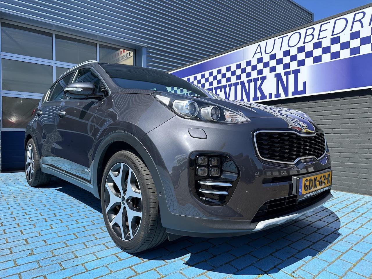 Kia Sportage - 1.6 T-GDI 4WD CRUISE PANO LEER TREKH P-CAM - AutoWereld.nl