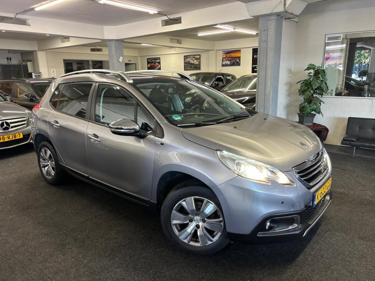Peugeot 2008 - 1.2 PureTech Allure*Pano*Clima*Led*2015 - AutoWereld.nl
