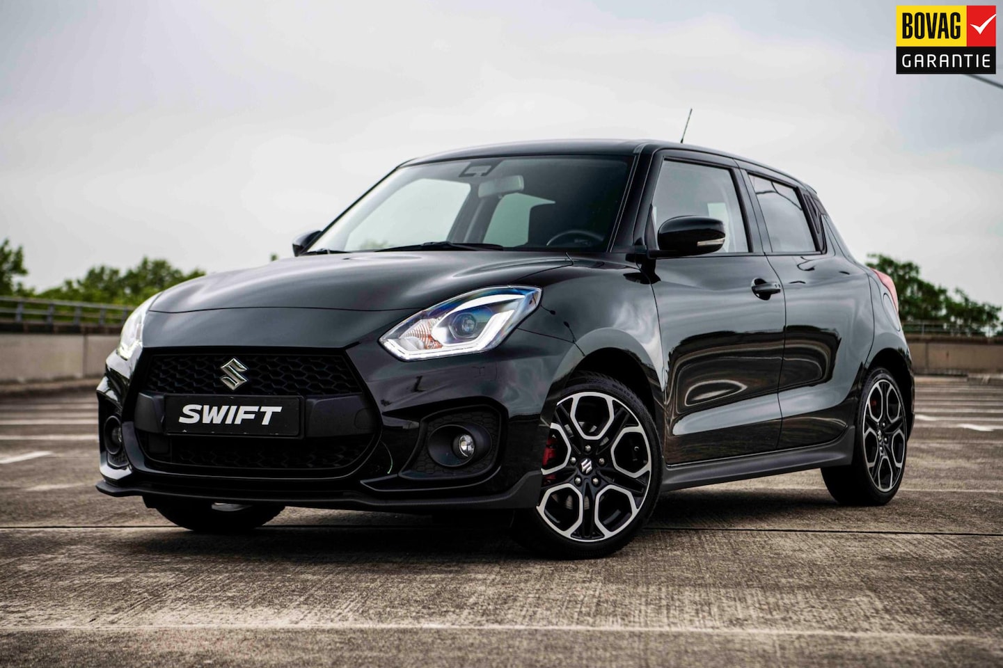 Suzuki Swift - 1.4 Sport Smart Hybrid | Airco/Clima | Achteruitrijcamera | Adaptive Cruise Control | Stoe - AutoWereld.nl