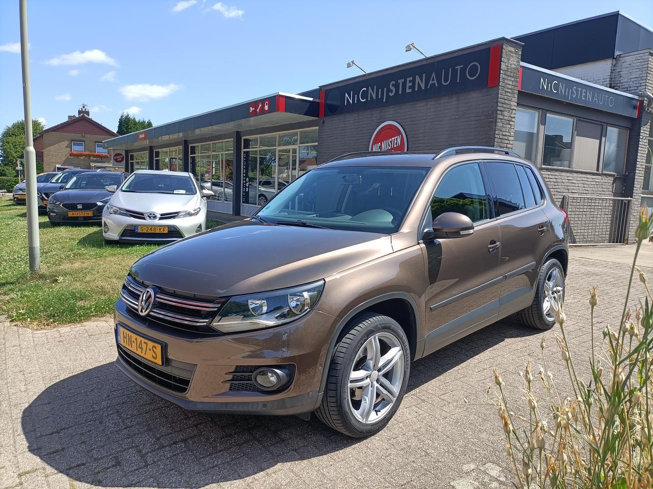 Volkswagen Tiguan - 1.4 TSi, Trekhaak, Clima, Parkeerass. - AutoWereld.nl