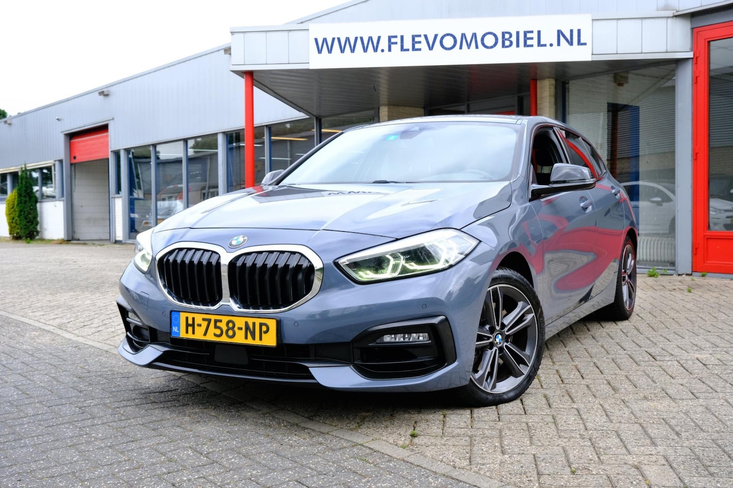 BMW 1-serie - 118i 140pk Executive Edition Aut. Pano|Sporstoelen|Navi|Apple CarPlay - AutoWereld.nl