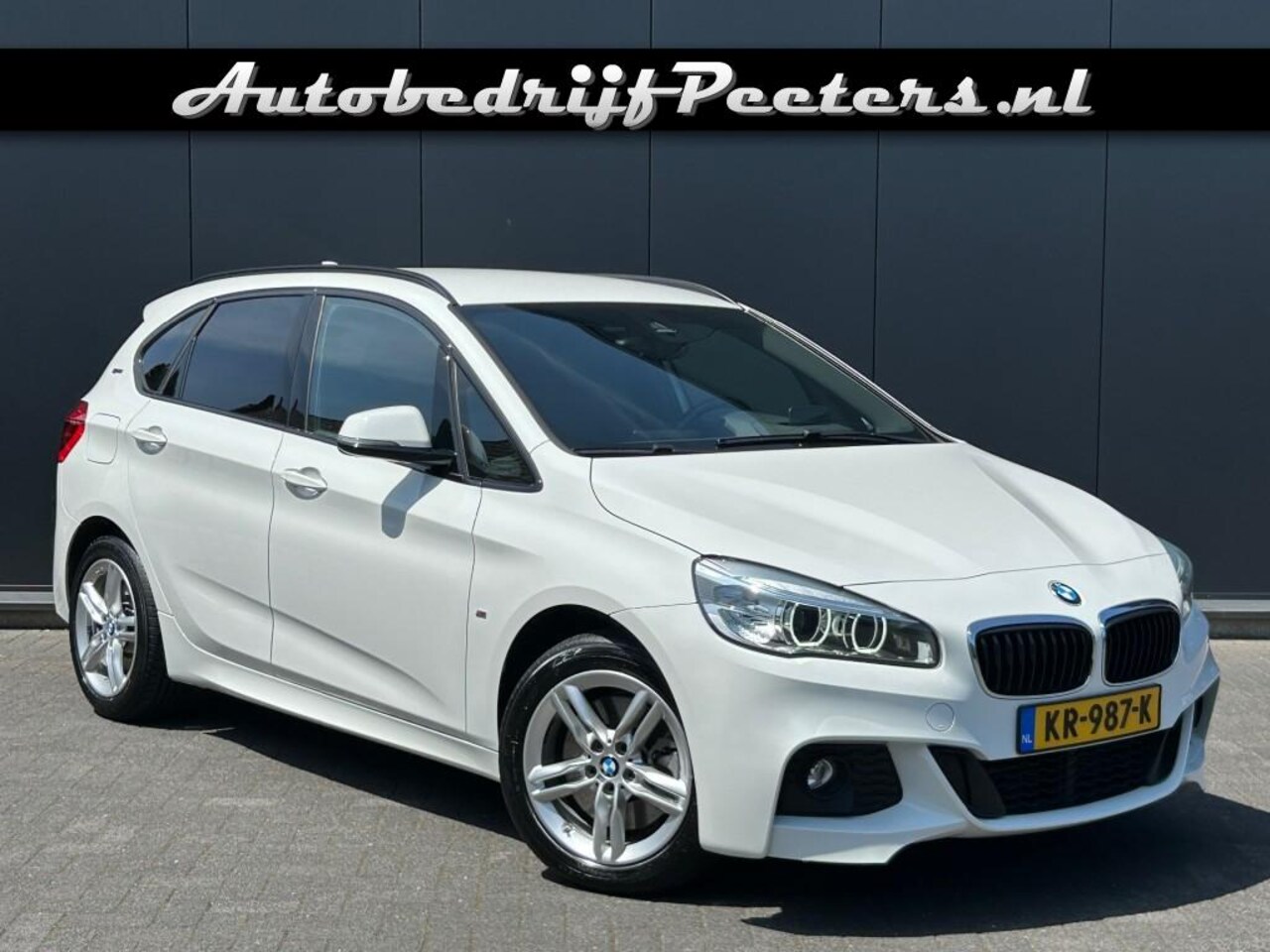 BMW 2-serie Active Tourer - 225xe M Sport Shadow Leder Navi+ HUD Cruise E.klep NL-auto - AutoWereld.nl