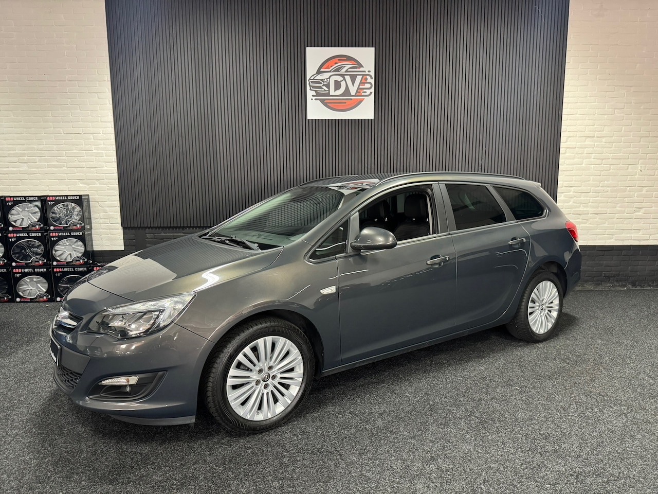 Opel Astra Sports Tourer - 1.4 Edition 1.4 Edition, TREKHAAK, USB, AIRCO, ELEK PAKKET,HALF LEDER, LMV - AutoWereld.nl