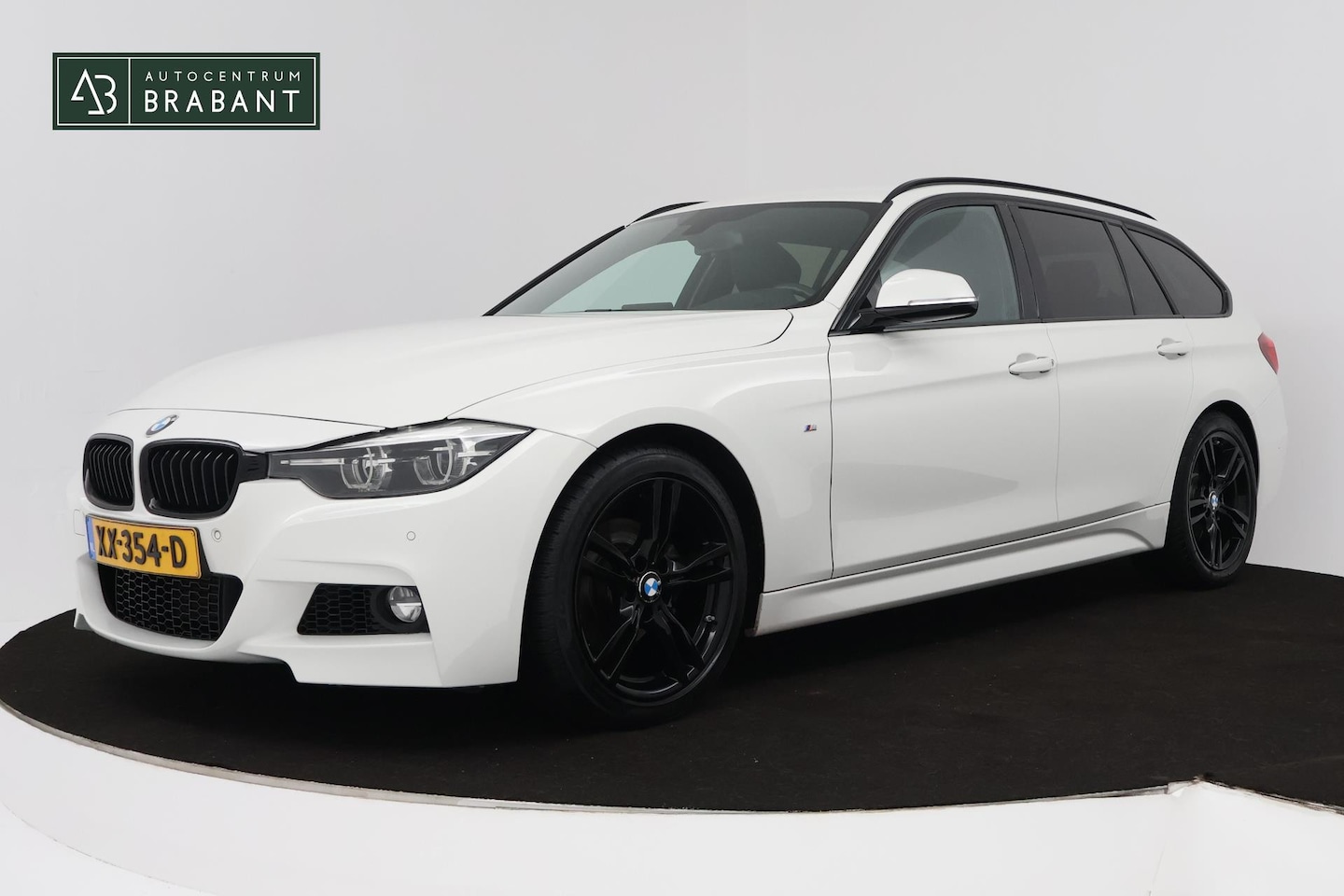BMW 3-serie Touring - 318i M Sport Edition (STOELVERWARMING, NAVIGATIE, PARKEERSENSOREN, AUTOMAAT, CRUISE CONTRO - AutoWereld.nl