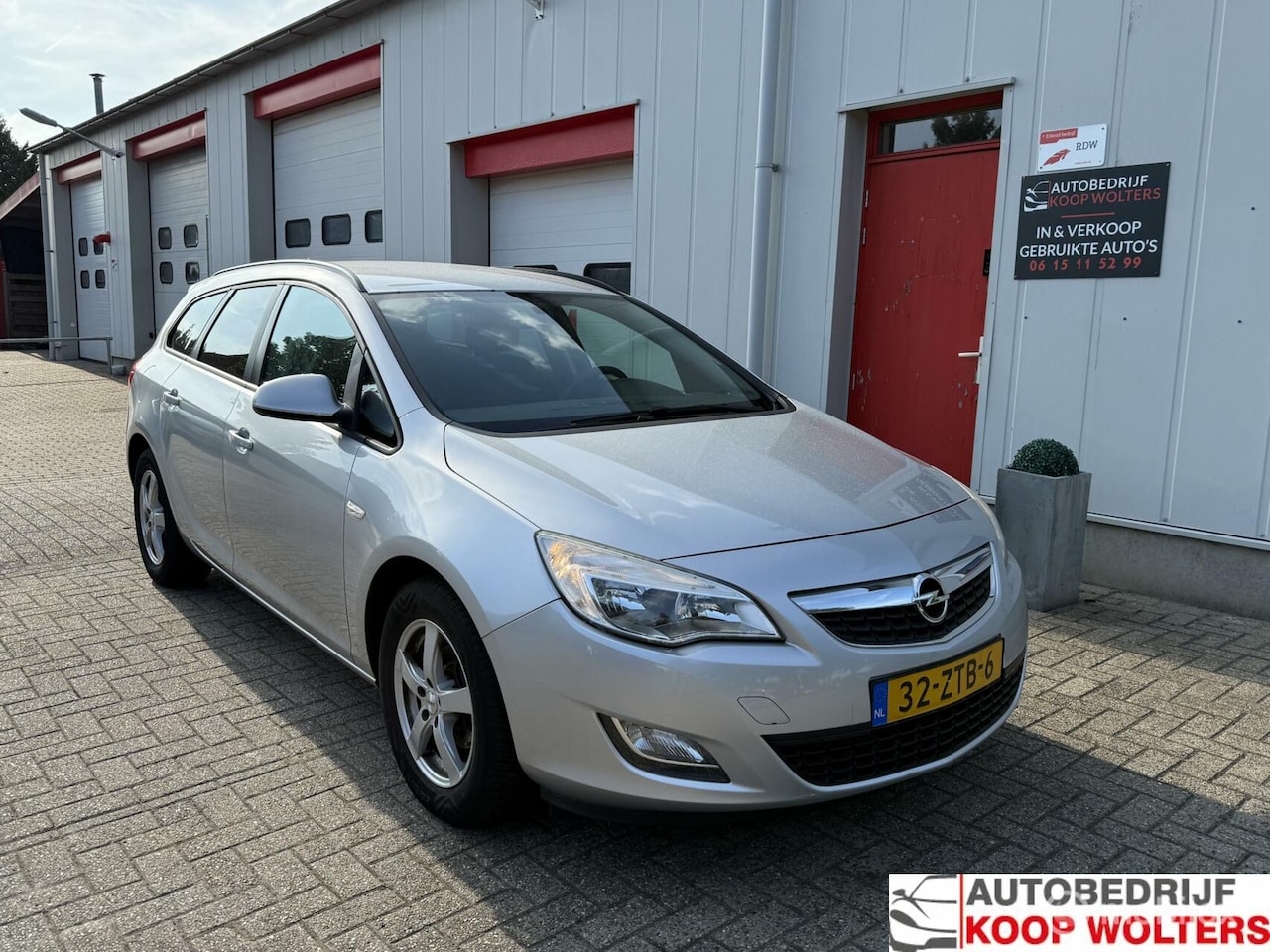 Opel Astra Sports Tourer - 1.4 Turbo Business 1.4 Turbo Business + - AutoWereld.nl