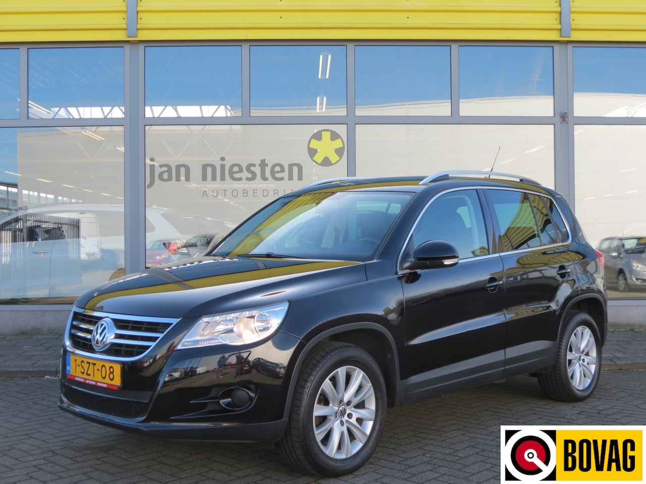 Volkswagen Tiguan - 2.0 TSI Sport&Style 4Motion -170pk- Automaat | Trekhaak | Leder | Rijklaarprijs incl. 6 ma - AutoWereld.nl