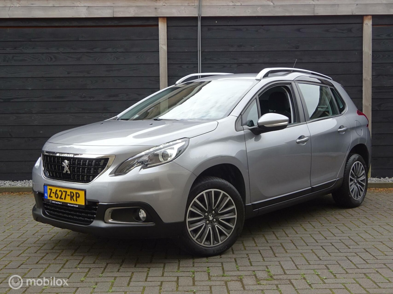 Peugeot 2008 - 1.2 Airco / FM nav / Carkit / 4 seizoen banden / 82.389 KM!!! - AutoWereld.nl