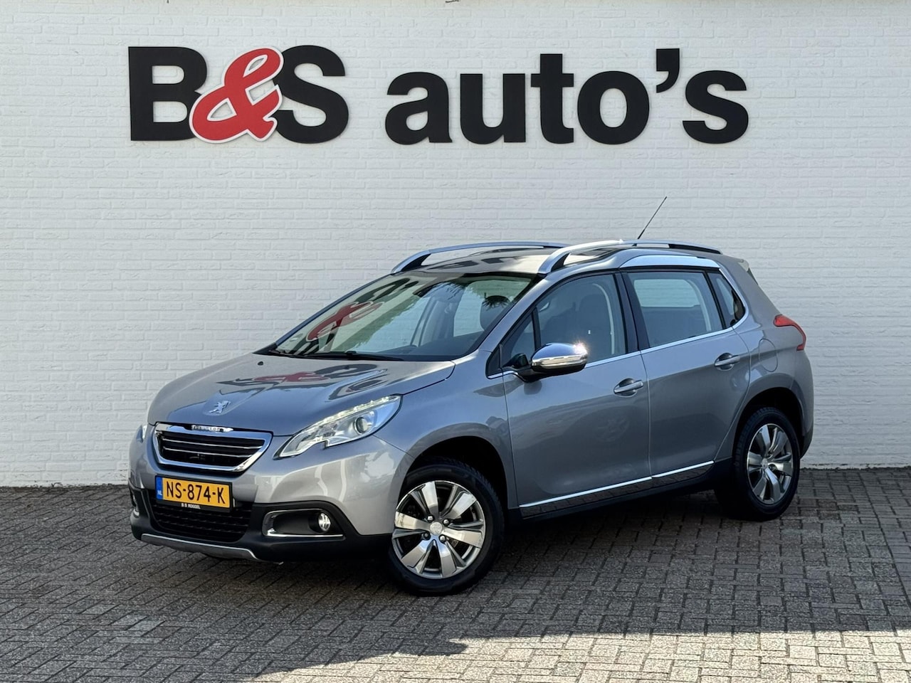 Peugeot 2008 - 1.6 VTi Allure Cruise control Climate control Navigatie Interieur half leder/half stof - AutoWereld.nl