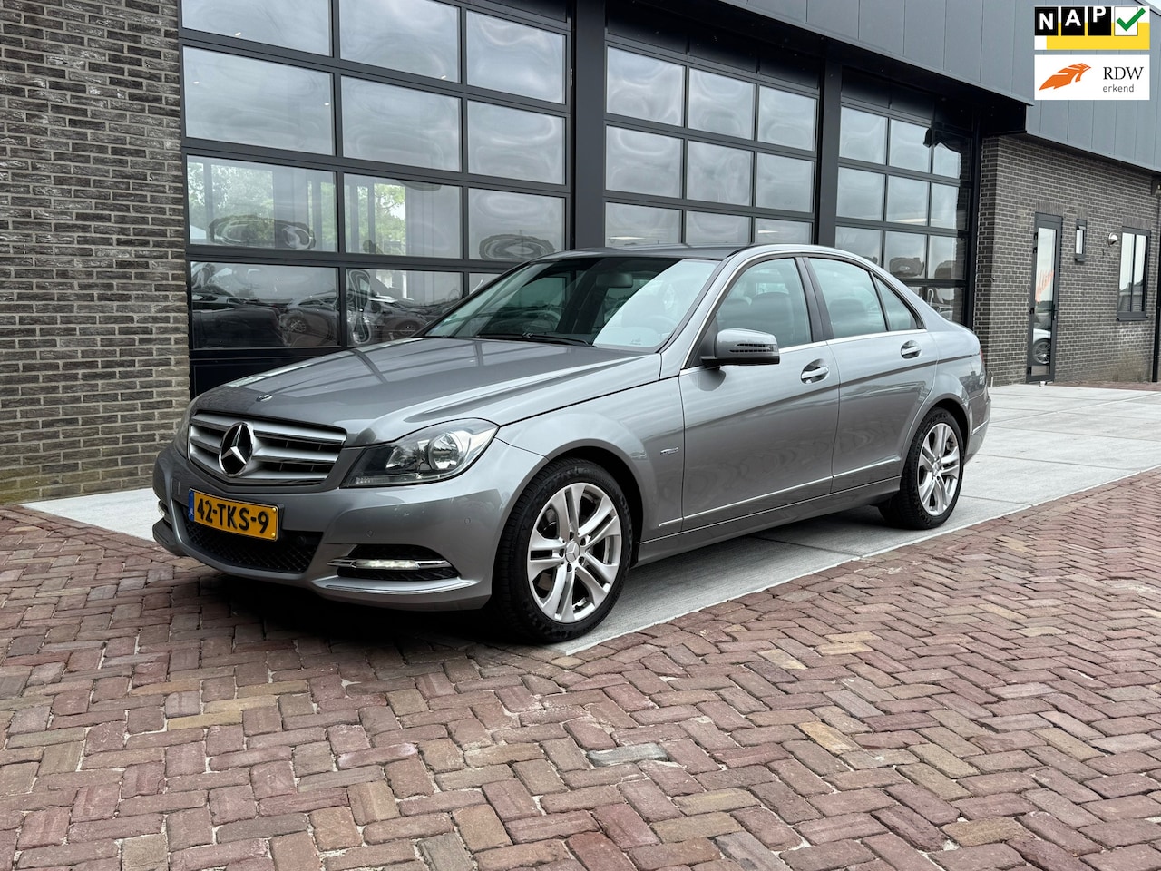 Mercedes-Benz C-klasse - 180 Premium Edition | Autm | 1/2 Leer | Navi | Stoelver | - AutoWereld.nl