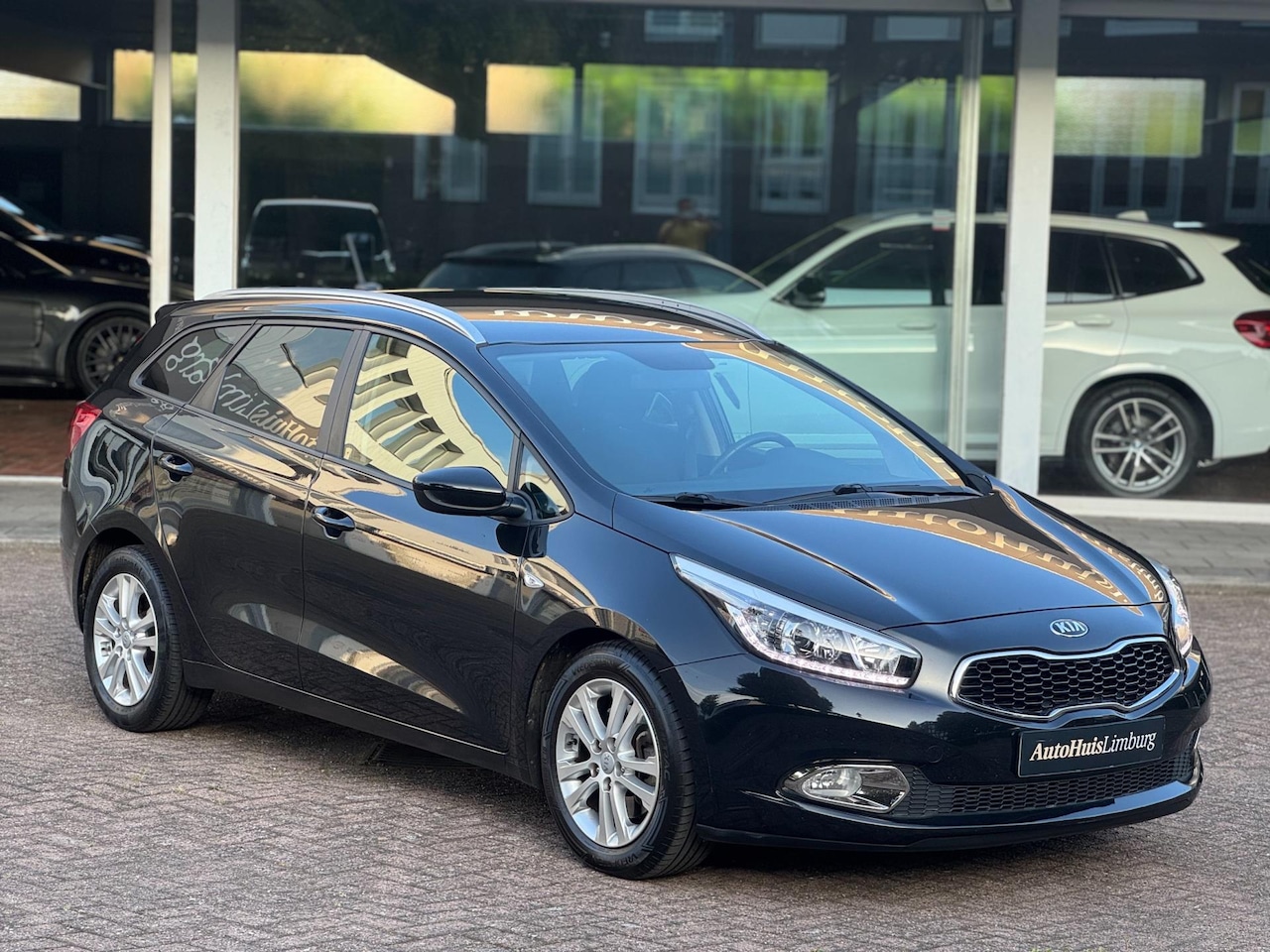 Kia Cee'd Sportswagon - 1.6 GDI|ComfortLine Navigatie|Camera|Volledig Kia Dealer onderhouden|Origineel NL - AutoWereld.nl